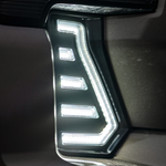 Aspire V2 Fang Lights with white DRLs and sequential amber turn signals for 2024-2026 Toyota Tacoma